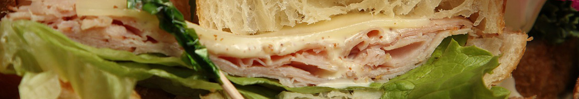 Eating Deli Pizza Sandwich at Amalfi restaurant in Waterbury, CT.